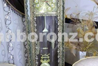 ساعت ایستاده برنزی مدل نیم گرد گل نیلوفری