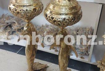 شکلات خوری برنزی مدل دلفین پایه سنگ مشکی